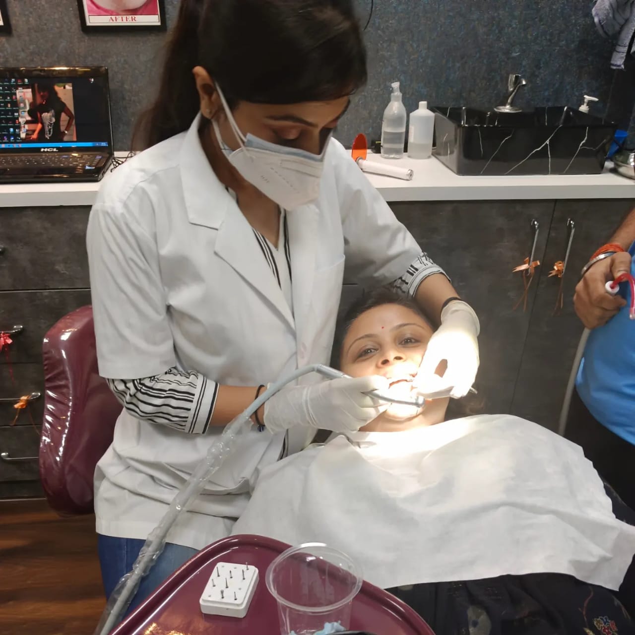 Dr. Surbhi, best dentist in gwalior doing treatment of her patient with care